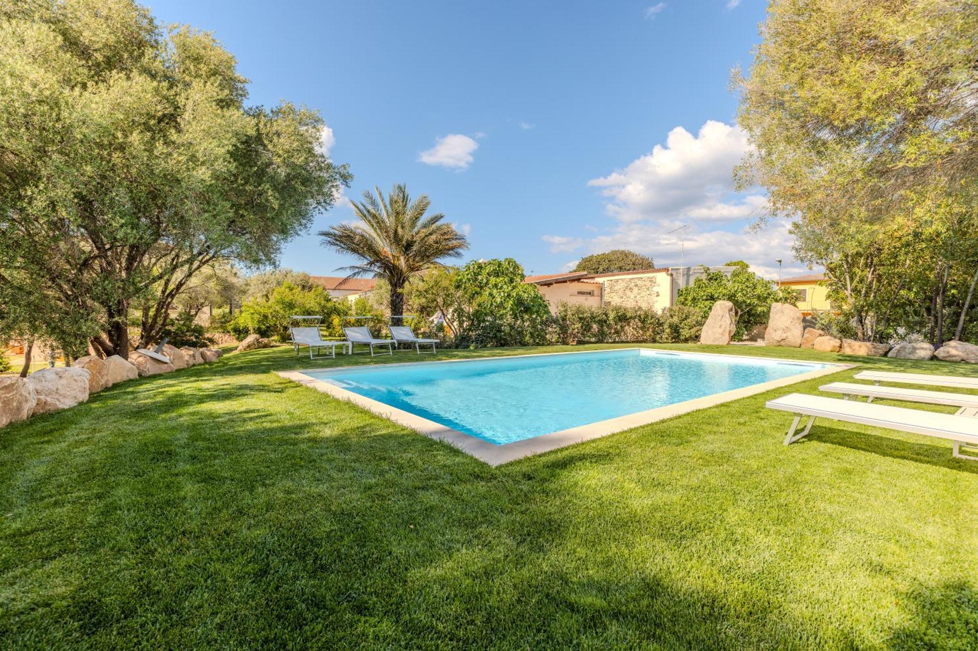 דירות Stazzo San Teodoro L'Olivastro Piscina Condivisa מראה חיצוני תמונה