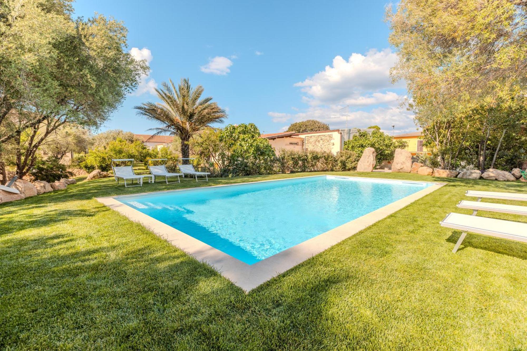 דירות Stazzo San Teodoro L'Olivastro Piscina Condivisa מראה חיצוני תמונה